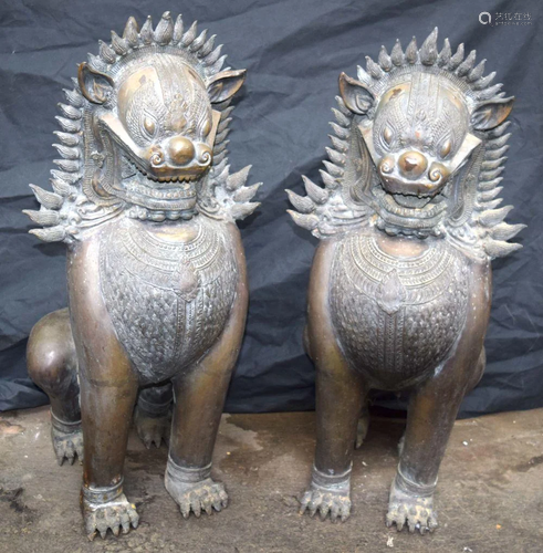 A LARGE PAIR OF SOUTH EAST ASIAN BRONZE PALACE FOO DOGS. 103...