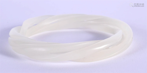 A 19TH CENTURY CHINESE CARVED WHITE JADE MULTI BANGLE Qing. ...