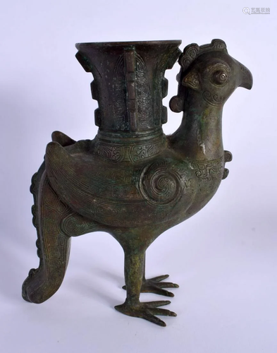 A CHINESE QING DYNASTY BRONZE FIGURE OF A MYTHICAL BIRD deco...