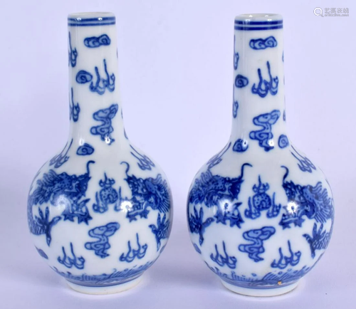 A PAIR OF CHINESE BLUE AND WHITE VASES 20th Century. 11 cm h...