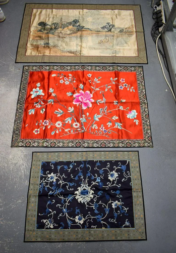 THREE 19TH CENTURY CHINESE SILK WORK PANELS in various forms...