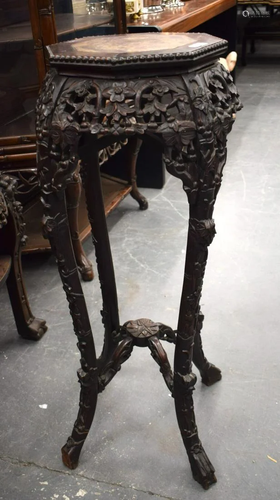 A 19TH CENTURY CHINESE CARVED HARDWOOD MARBLE INSET STAND. 9...