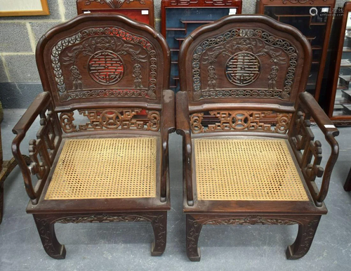 A PAIR OF EARLY 20TH CENTURY CHINESE HARDWOOD CHAIRS Late Qi...