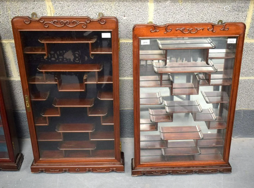 A PAIR OF EARLY 20TH CENTURY CHINESE CARVED HARDWOOD SNUFF B...