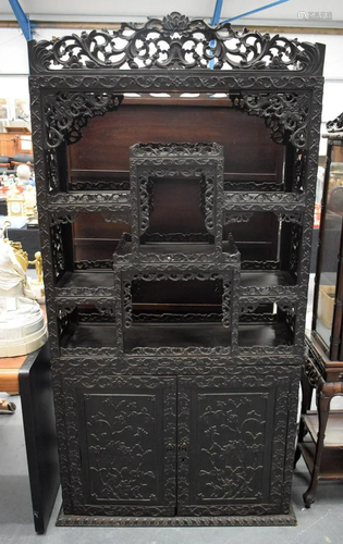 A LARGE 19TH CENTURY CHINESE HONGMU HARDWOOD DISPLAY CABINET...