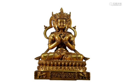 A Gilt-Bronze Figure of Guanyin With Three Faces