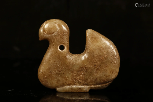 A Hongshan Culture Jade 'Bird' Pendant.