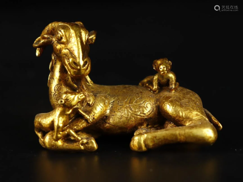 A Gilt-Bronze Ram And Calves
