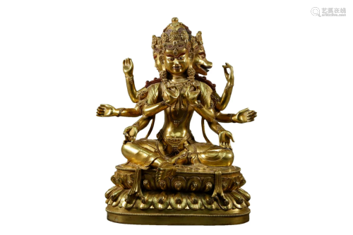 A Gilt-Bronze Figure of Eight-Armed Multi-Faced Buddha