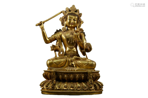 A Gilt-Bronze Figure of Four-Armed Manjusri