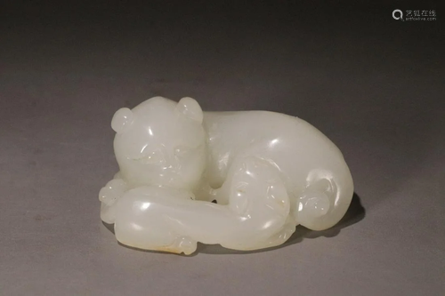 A Crouching Hetian Jade Beast And Its Cub