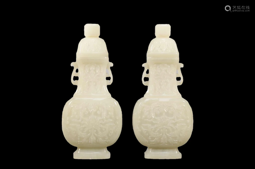 A Pair Of White Jade Vases