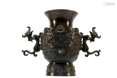 An exquisite bronze dragon vase