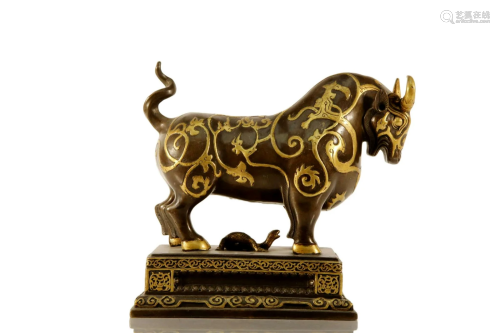 A Gilt-Bronze Ox Ornament