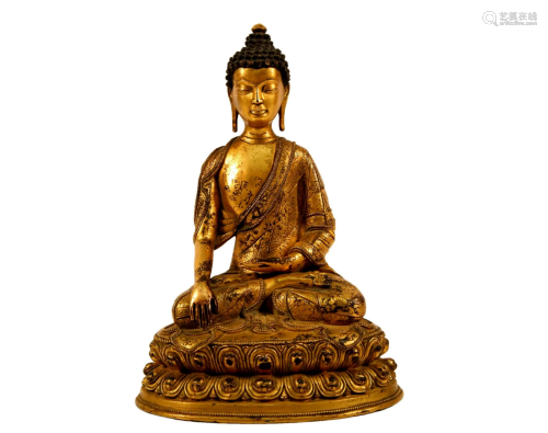 A Gilt Bronze Figure Of Buddha