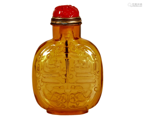 A Amber Glass 'Chi-Dragon' Snuff Bottle