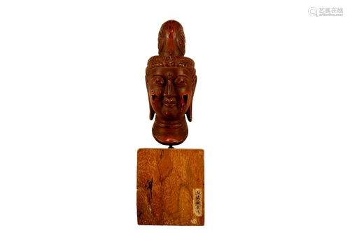 A Lacquered Wood Head Of Avalokitesvara