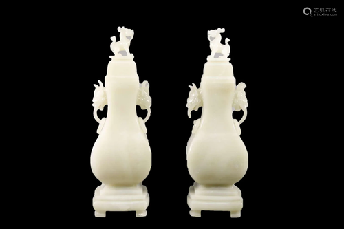 A Pair Of White Jade 'Kylin' Vases