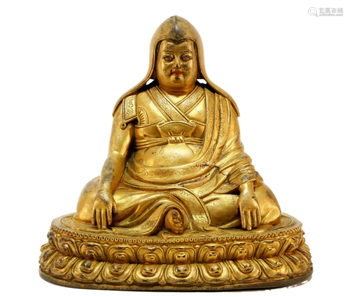 A rare gilt bronze Tsongkapa statue