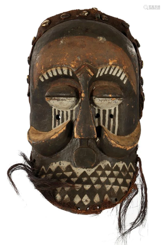 Wooden ceremonial mask with beard