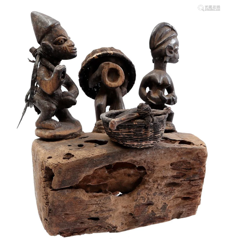 Wooden ceremonial statue with block with figures