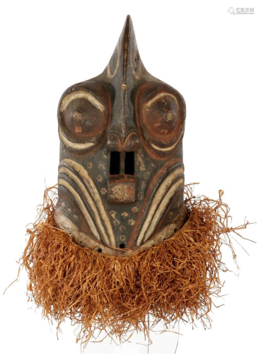 Wooden ceremonial mask with flax