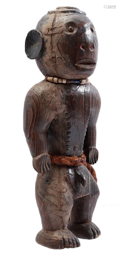 Wooden ceremonial statue of a standing man