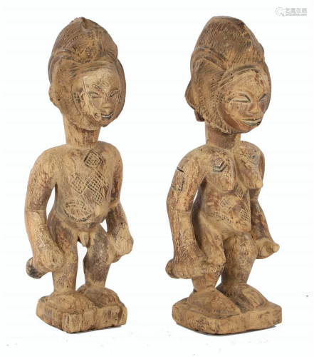 2 wooden ceremonial Punu statues of a man and a woman