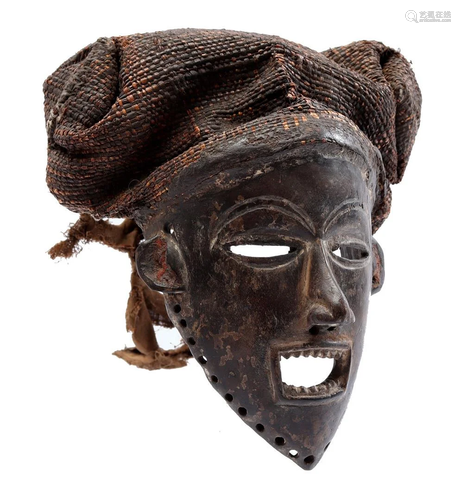 Wooden ceremonial mask with textile and flax