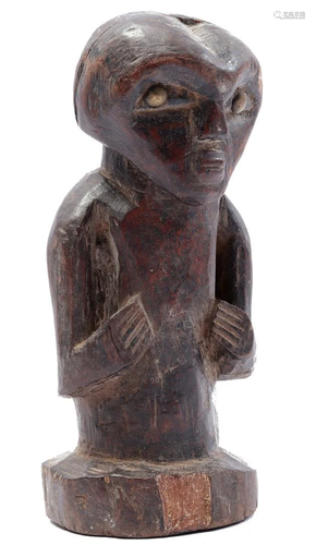 Wooden ceremonial statue of a standing person