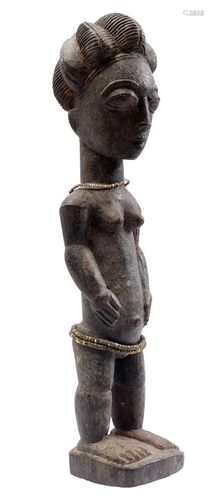 Wooden ceremonial statue of a woman