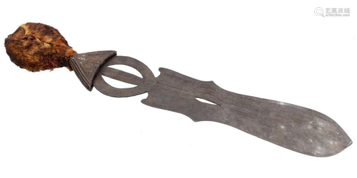 Ceremonial knife with carved wooden handle