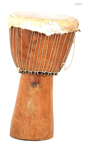 Wooden djembe with rope and animal skin