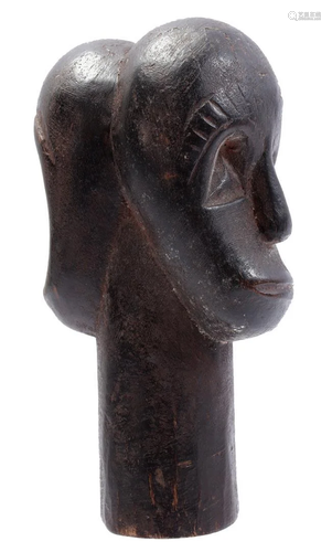 Wooden ceremonial "Janus" figurine