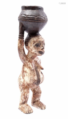 Wooden ceremonial statuette of a standing woman