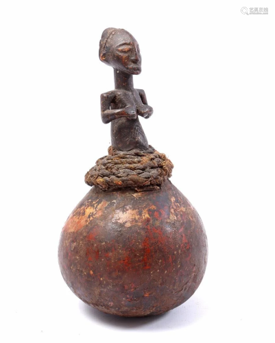 Wooden fertility statue on calabash, Africa ca. 1950