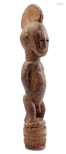 Wooden ceremonial statue of a standing man