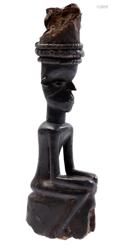 Wooden ceremonial fertility figurine