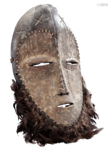 Wooden ceremonial mask decorated