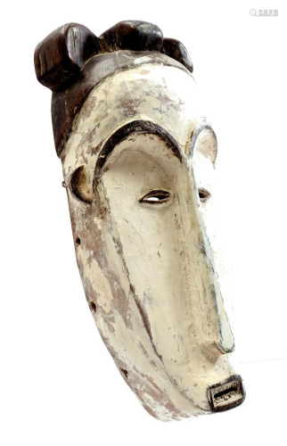 Wooden ceremonial mask decorated with kaolin