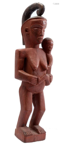 Wooden ceremonial statue, mother with child