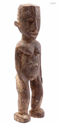 Wooden ceremonial statuette of a standing woman