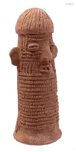 Earthenware ceremonial statue with face