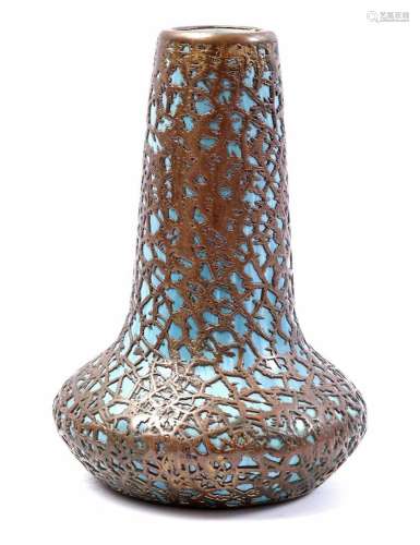 Ceramic vase, set in bronze frame