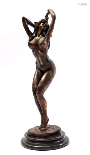 Bronze sculpture of a standing naked lady