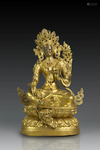 A TIBETAN GILT BRONZE BUDDHA STATUE, MID-QING DYNASTY