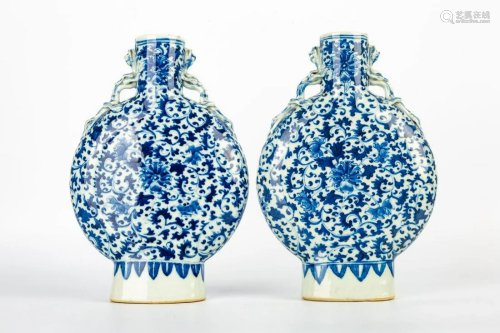 A PAIR OF BLUE AND WHITE PORCELAIN DRAGON EAR VASES, MID QIN...