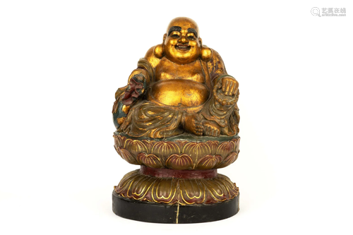 A GILT WOOD CARVED BUDHHA, 19TH CENTURY