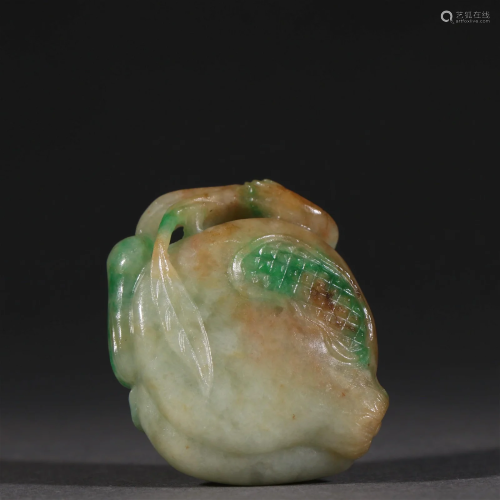 A Delicate Jadeite Carved Shou Tao Pendant