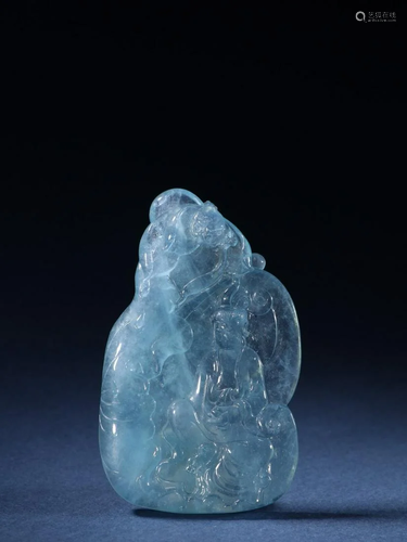 A Rare Carved Aquamarine Figure of Guanyin